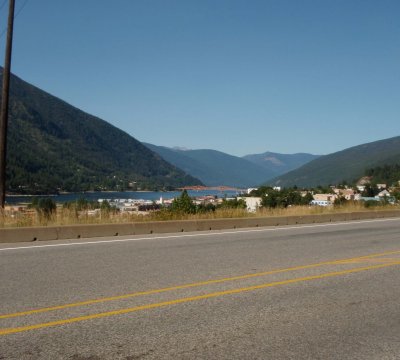 BOB the Big Orange Bridge, over the west arm of the Kootenay Lake, at Nelson, in the distance